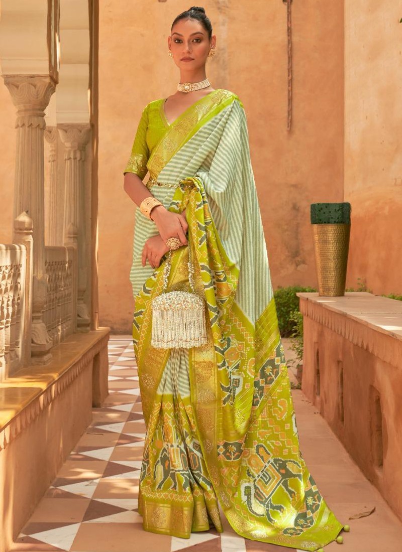 Apple Green Mysore Silk Saree accentuated with contrast zari border & pallu  of zari strip designs
