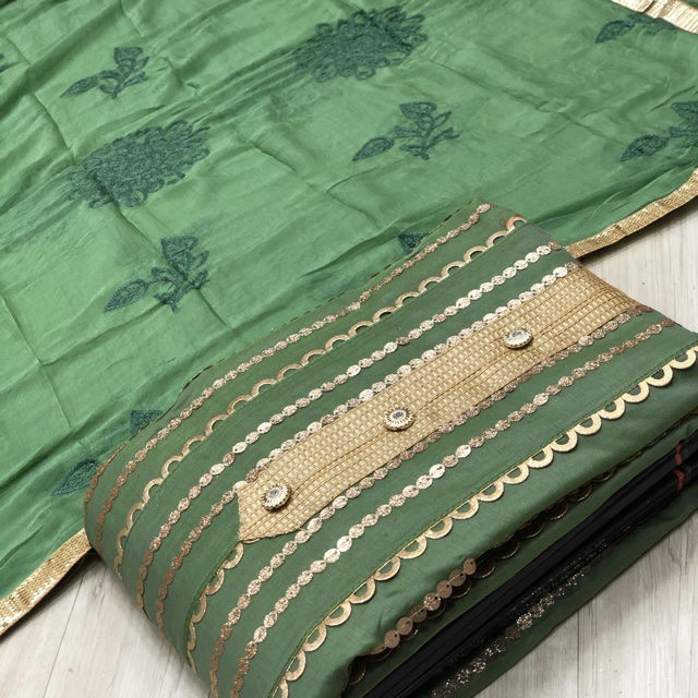New Design Festive Wear Modal Fabric Dress Material With Four Sided Golden Lace Bordered Dupatta  