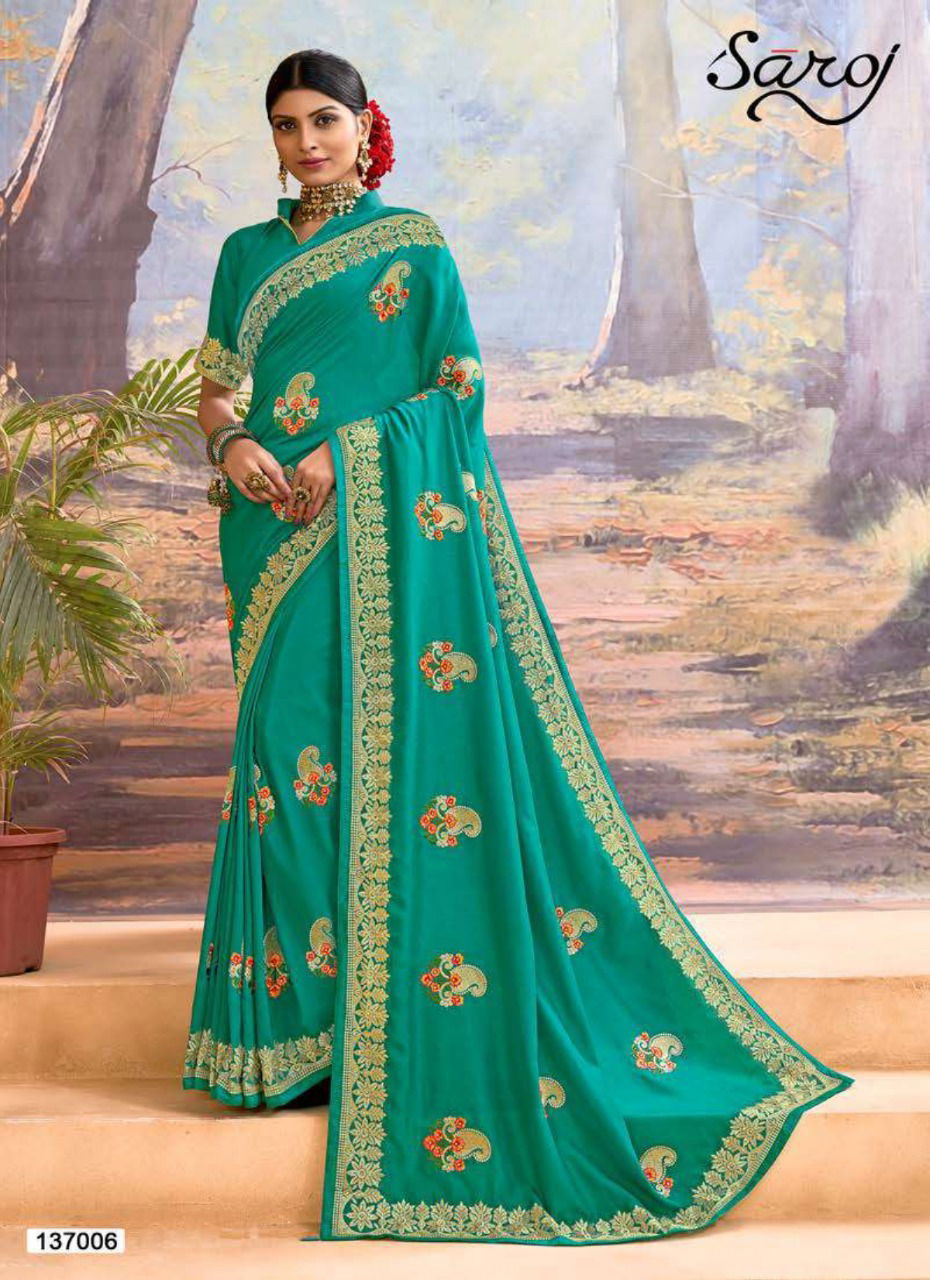 SAROJ KANGANA Fancy Festive Wear Heavy Designer Vichitra Silk With Embroidery Work On Border And Butta Saree Collection
