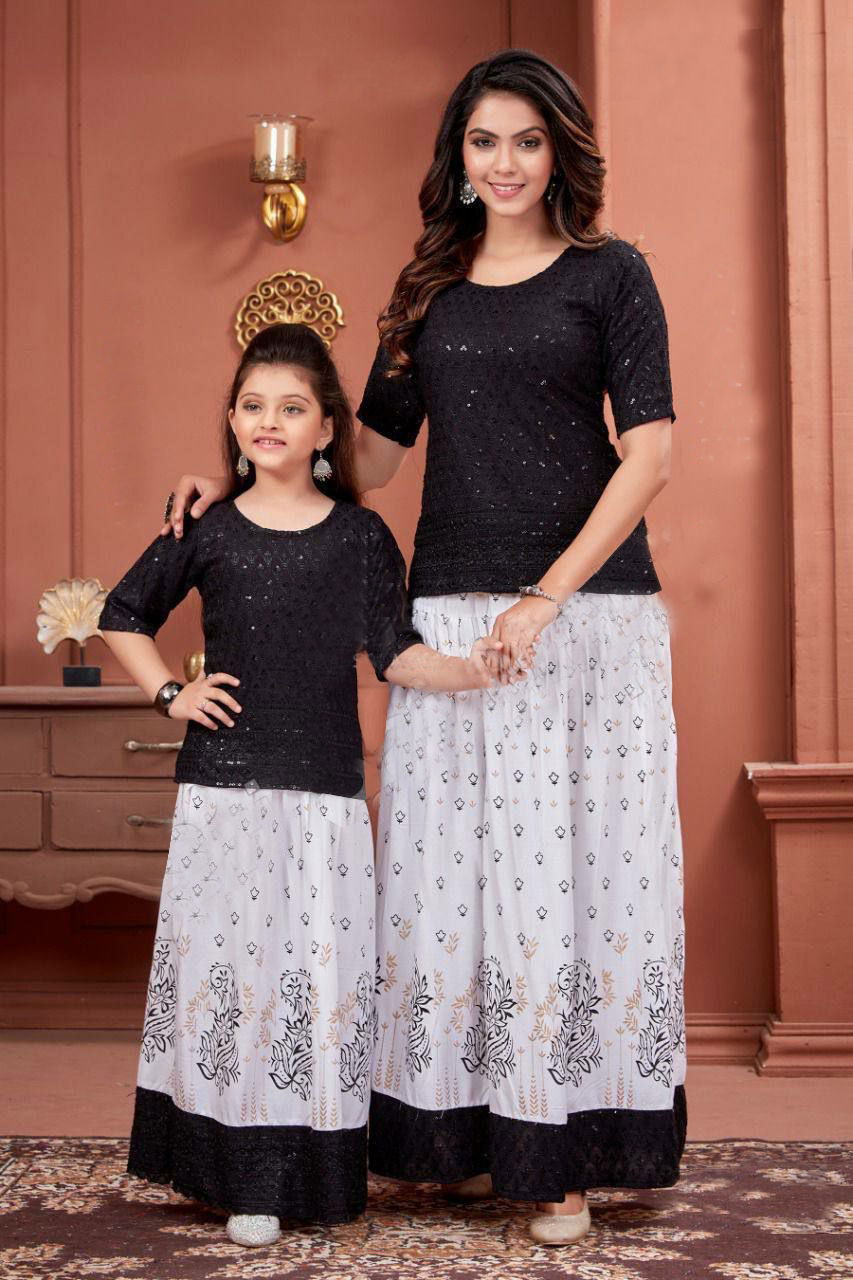 Lovely 01 Mother Daughter Combo Fancy Wear Printed Rayon Kurti With Skirt Collection