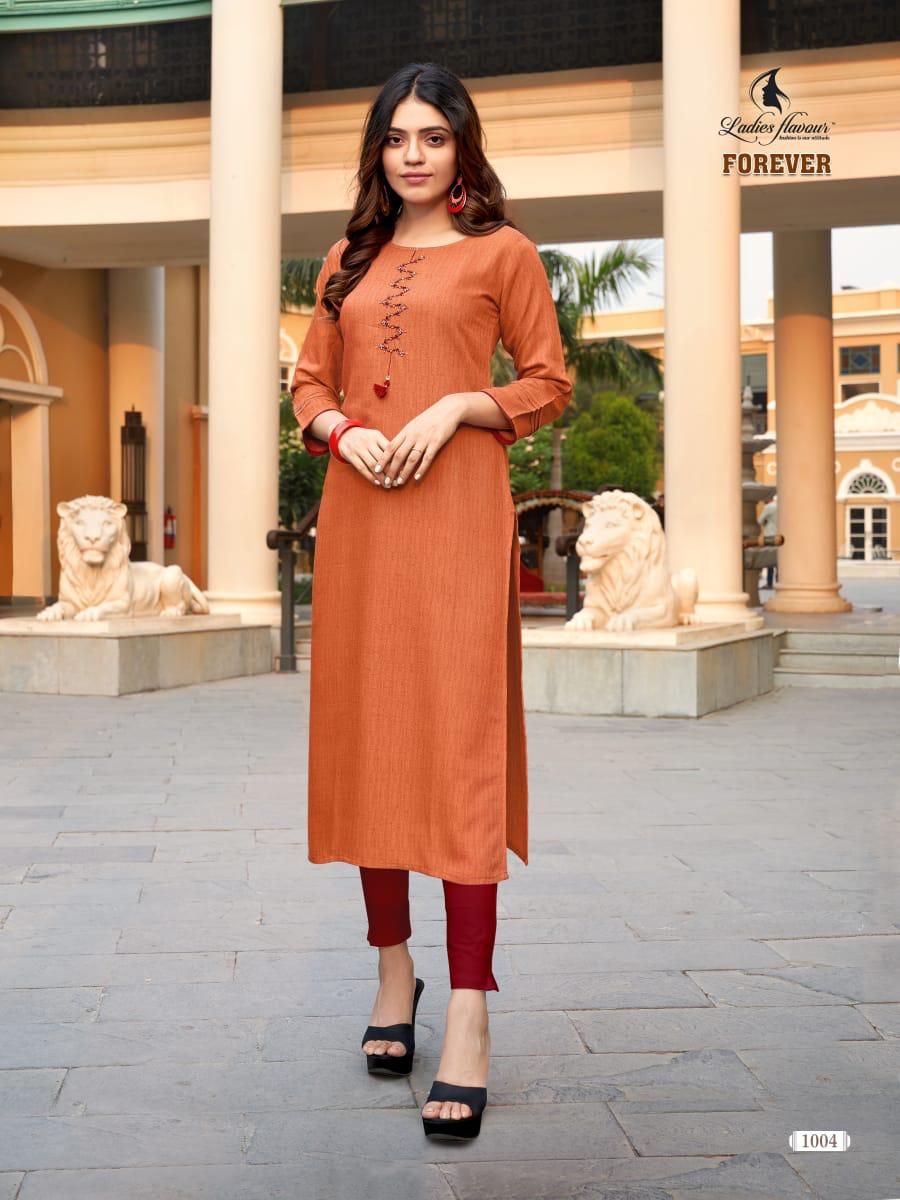 LADIES FLAVOUR FOREVER Latest Designer Festive Wear Fancy Rayon Weaving Pattern With Hand work Heavy Kurtis Collection 