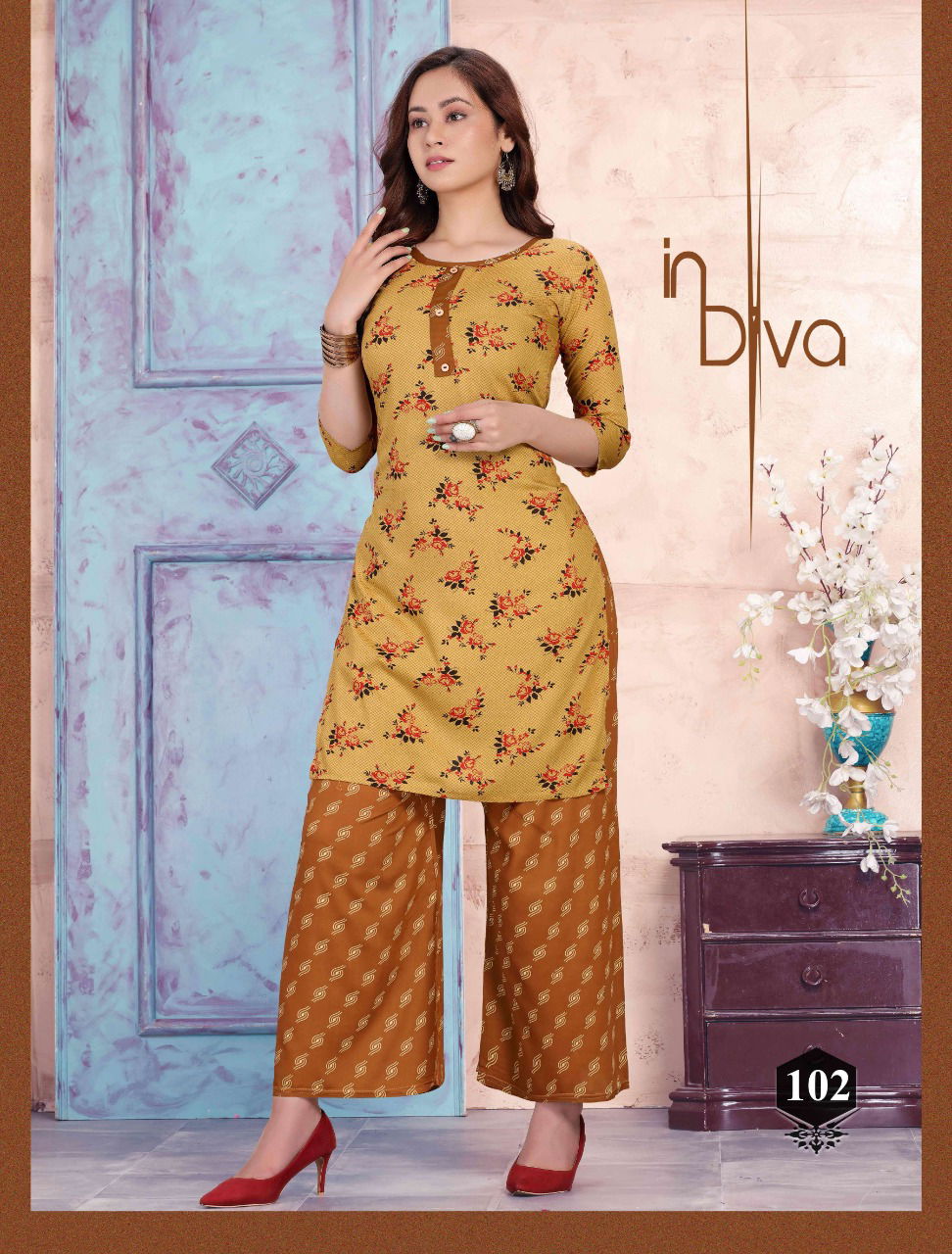Prinal Rosy Latest Fancy Designer Casual Wear Rayon Printed Kurtis With Bottom Collection
