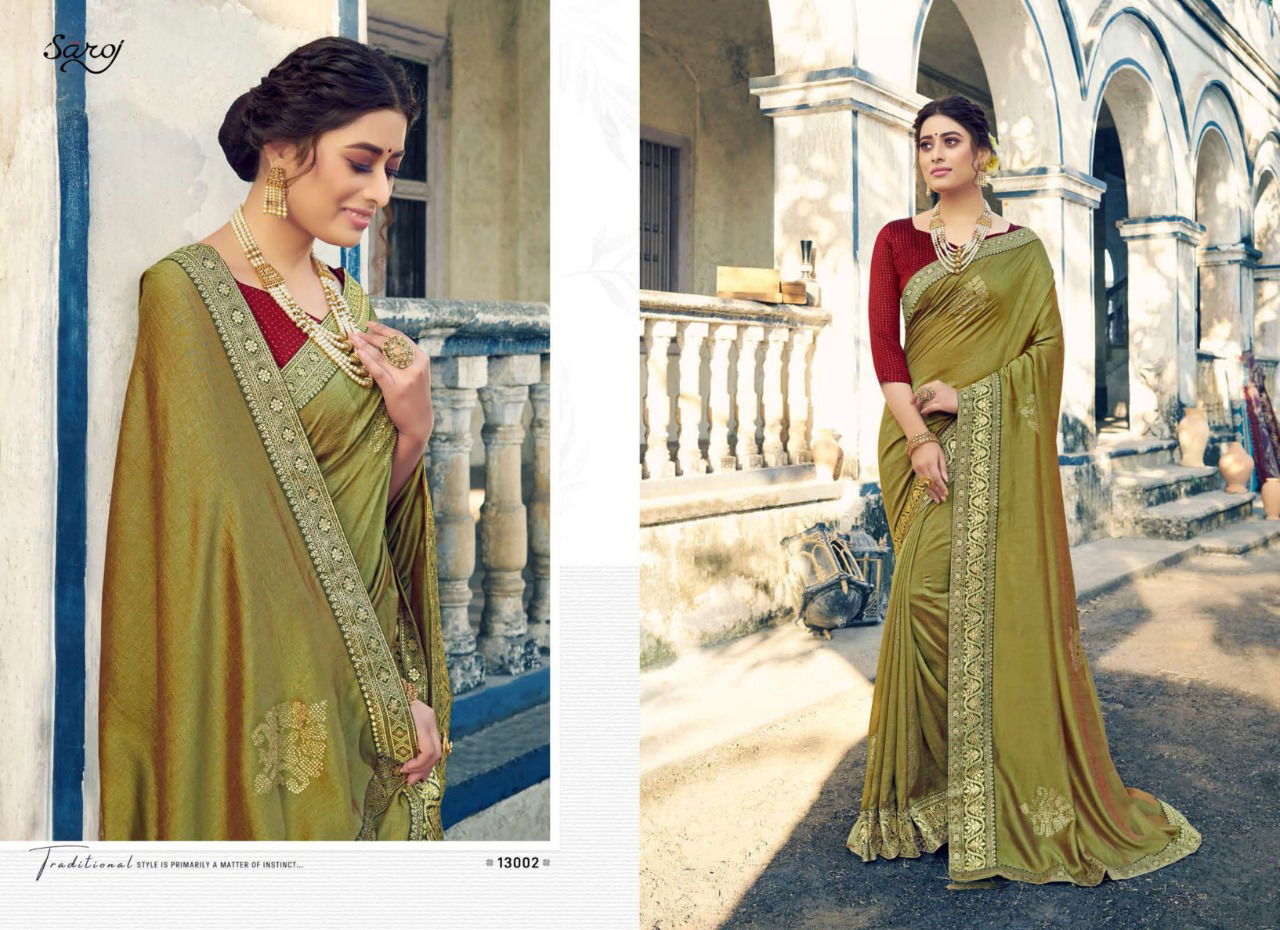 Saroj Tanvi Latest Fancy Festive Wear Designer Vichitra Silk With Beautiful Swarovski Butta And Banarasi Border Saree Collection
