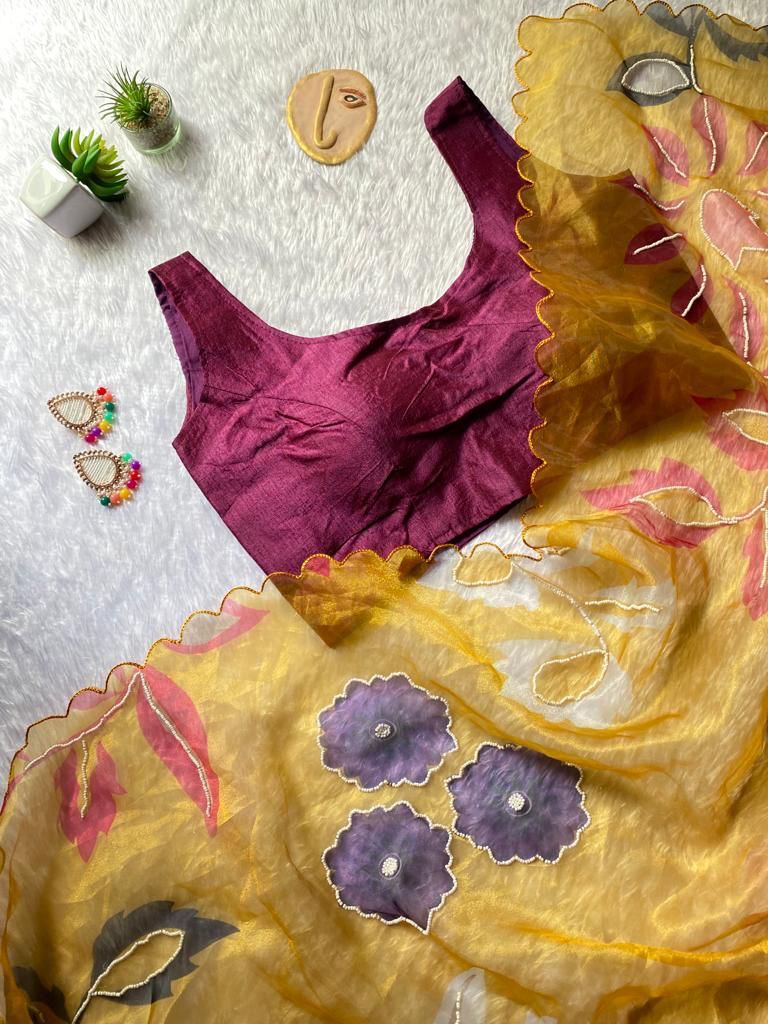 Mann Designer Organza Party Wear Sarees Catalog
