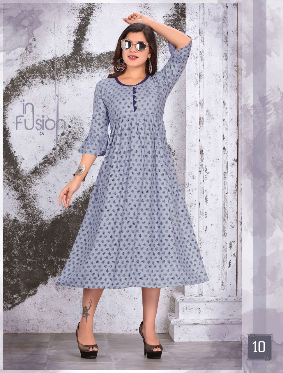 Diva Latest Fancy Regular Casual Wear Rayon Wear Printed Anarkali Rayon Kurtis Collection

