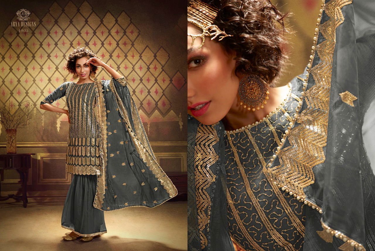Arya Noorani Saga 2 Wedding Designer Heavy Work Georgette Top With Dull Santoon Inner Net Bottom With Four Sided Bordered Dupatta Collection