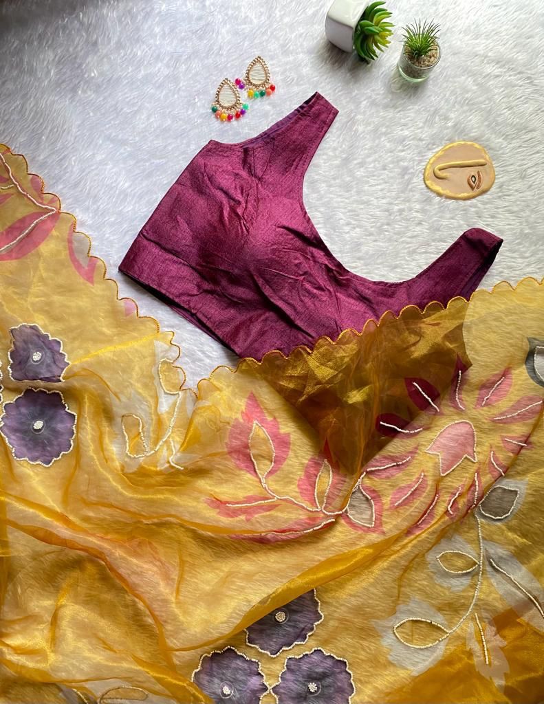 Mann Designer Organza Party Wear Sarees Catalog