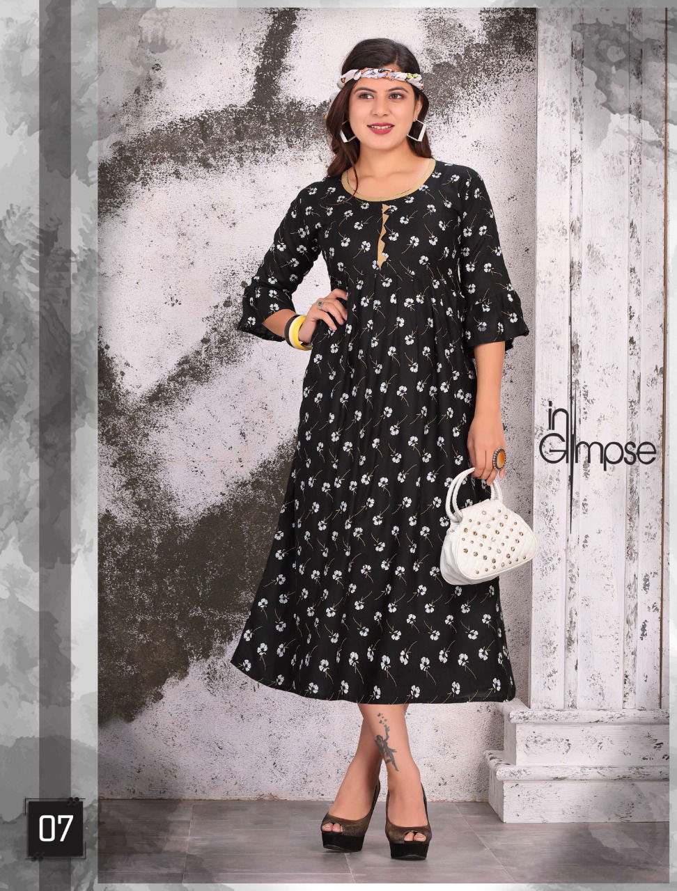Diva Latest Fancy Regular Casual Wear Rayon Wear Printed Anarkali Rayon Kurtis Collection
