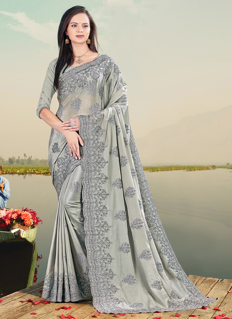 Sage green shimmer georgette saree adorn with moti scattered and heavy stone  embroidered border only on