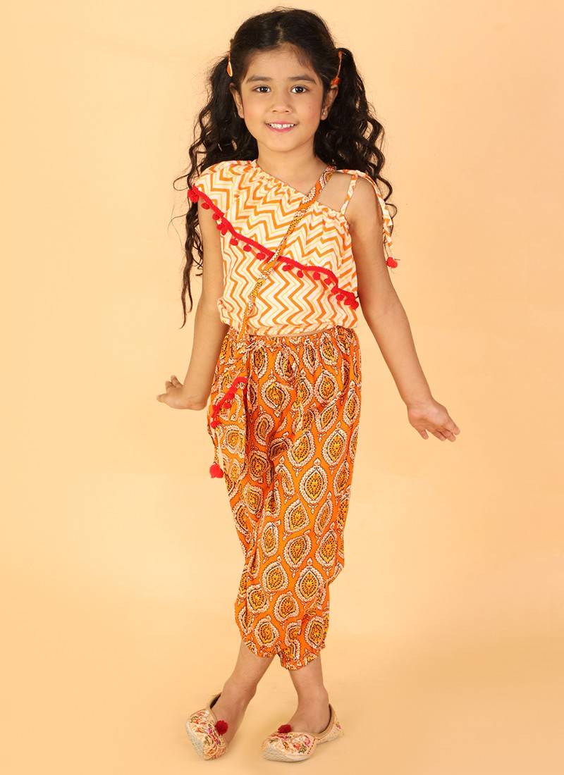 Orange Girls Track Pant in Pune at best price by Dhayal Tex - Justdial