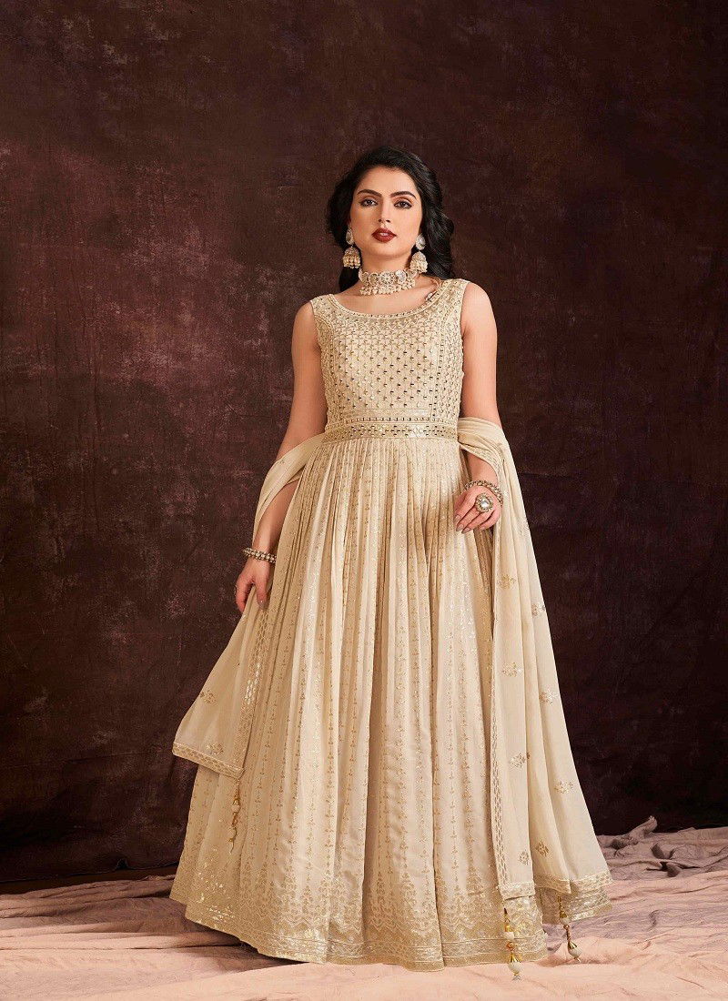 Cream Colour Zoya Vol 3 By Arya Designs Gown Catalog 63003