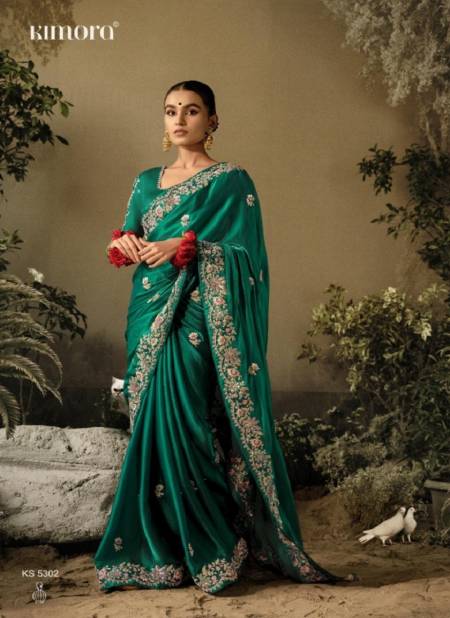 Green Colour Saawariya By Kimora Fancy Fabric Wedding Wear Saree Catalog 5302