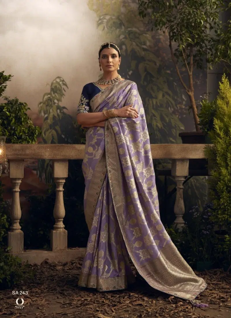 Lavender Colour Radha Rani By Kimora Dola Silk Designer Wear Sarees Suppliers In India SA 242