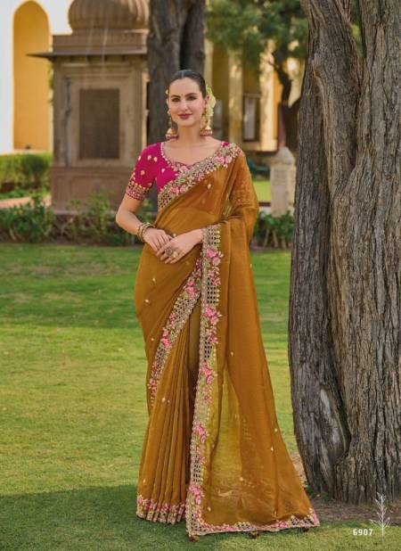 Mustard Colour Anaara 6900 Series By Tathastu Designer Fancy Tissue Organza Silk Saree Orders In India 6907
