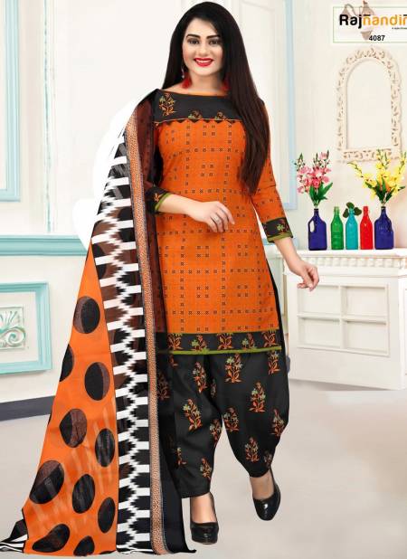 Orange And Black Colour Mohini Cotton Dress Material Catalog 4087