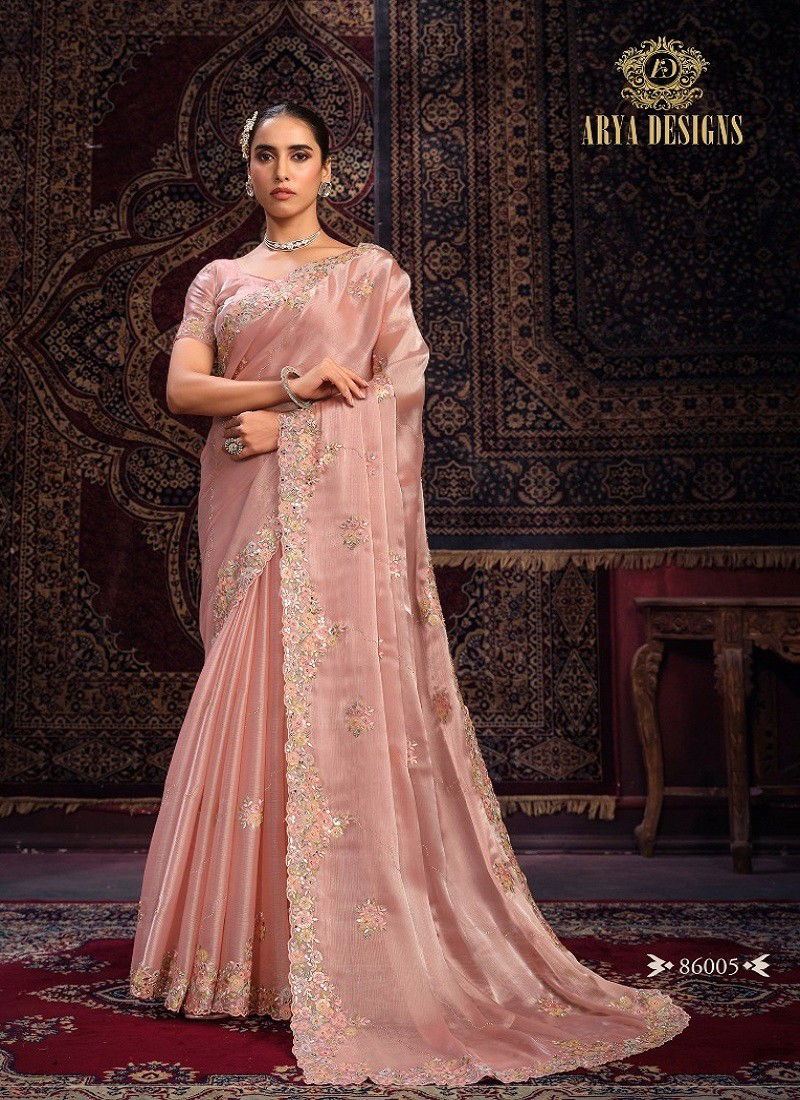 Peach Colour Swarna Vol 8 By Arya Designs Party Wear Georgette Saree Online Wholesale 86005