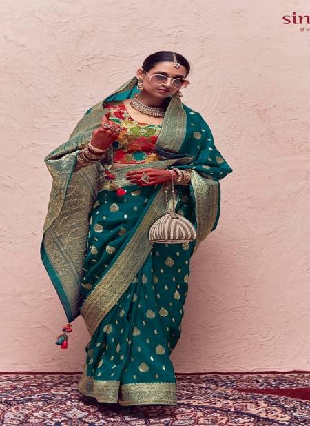 Rama Green Colour Sindhuri Kasturi By Kimora Zari Weaving Dola Silk Saree Catalog SA 199