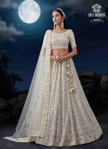 White Colour Kimaya VOL 5 By Arya Designs 90001 To 90010 Series Designer Net Lehenga Choli Wholesalers Suppliers In Mumbai 90009
