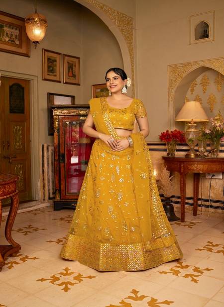 Yellow Colour SS 160 To 165 Wedding Wear Designer Net Lehenga Choli Wholesale Suppliers in Mumbai 1879