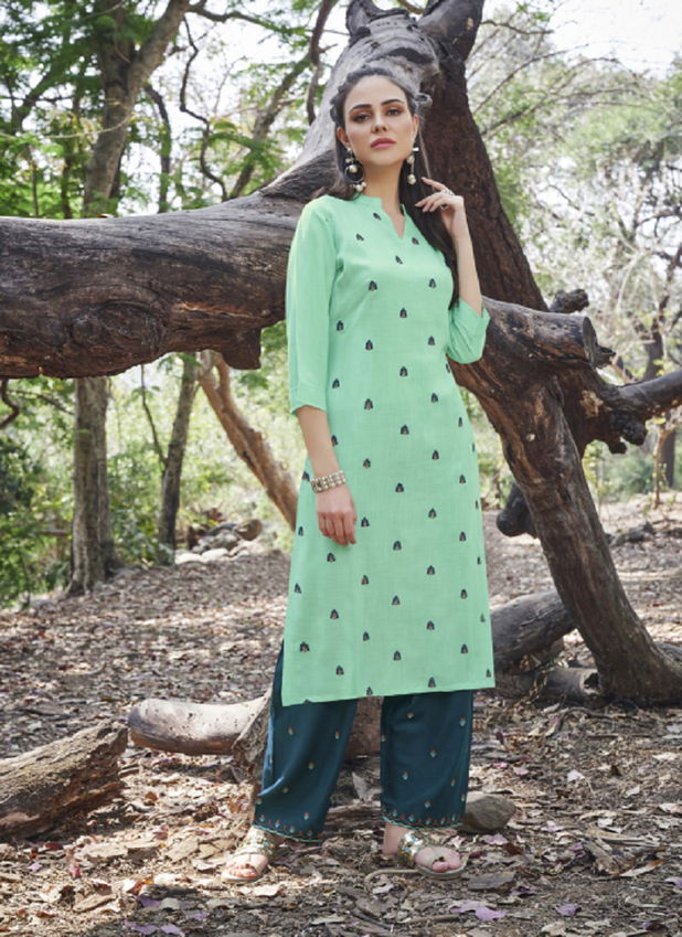 Tunic House Nirvi Fancy Ethnic Wear Rayon Kurti With Bottom Collection