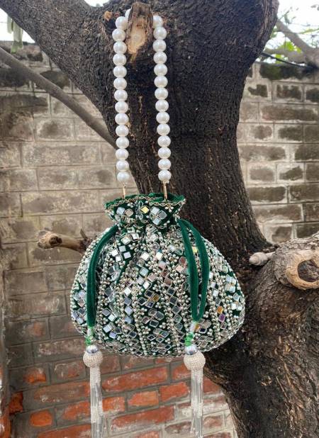 Wedding Wear Pearl Handle And Mirror Work Potli Bag Wholesale  Suppliers In India
