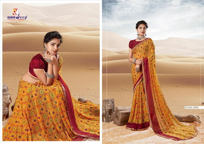 Kesariya Designer New Fancy Regular Wear Printed Georgette Designer Saree Collection