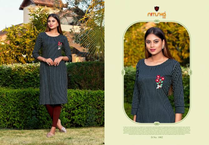 Nitisha Nx Kitab latest Heavy fancy Rayon Regular Wear Designer Kurtis Collection
