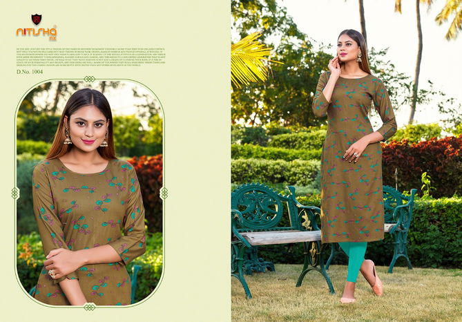 Nitisha Nx Kitab latest Heavy fancy Rayon Regular Wear Designer Kurtis Collection
