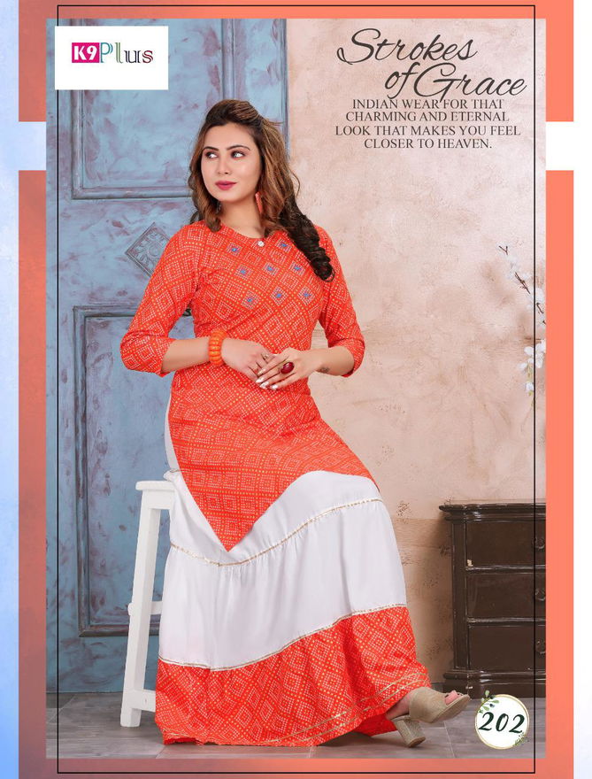 K9 Plus Margrett Latest Designer Festive Wear Rayon Bandhani Printed Top With Rayon skirt with gold print Kurti With Bottom Collection
