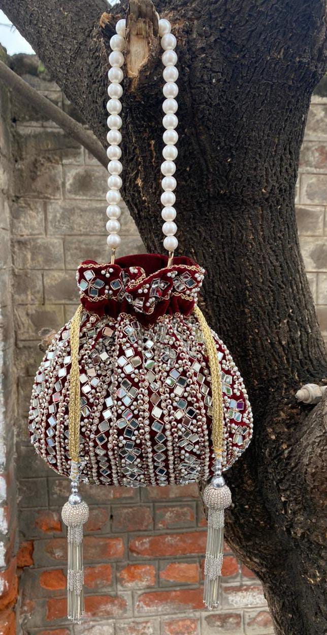 Wedding Wear Pearl Handle And Mirror Work Potli Bag Wholesale Suppliers In  India - The Ethnic World