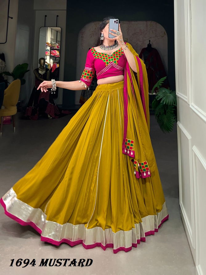 Aawiya 1694 Mustard Rayon Designer Navaratri Lehenga Choli Exporters In India