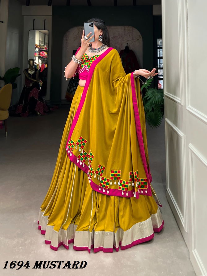 Aawiya 1694 Mustard Rayon Designer Navaratri Lehenga Choli Exporters In India